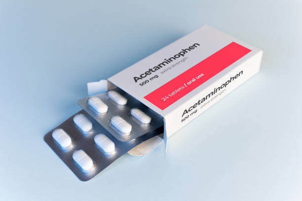 Bottles of Tylenol (acetaminophen) and Advil (ibuprofen) highlighting common OTC medications for TMJ pain relief
